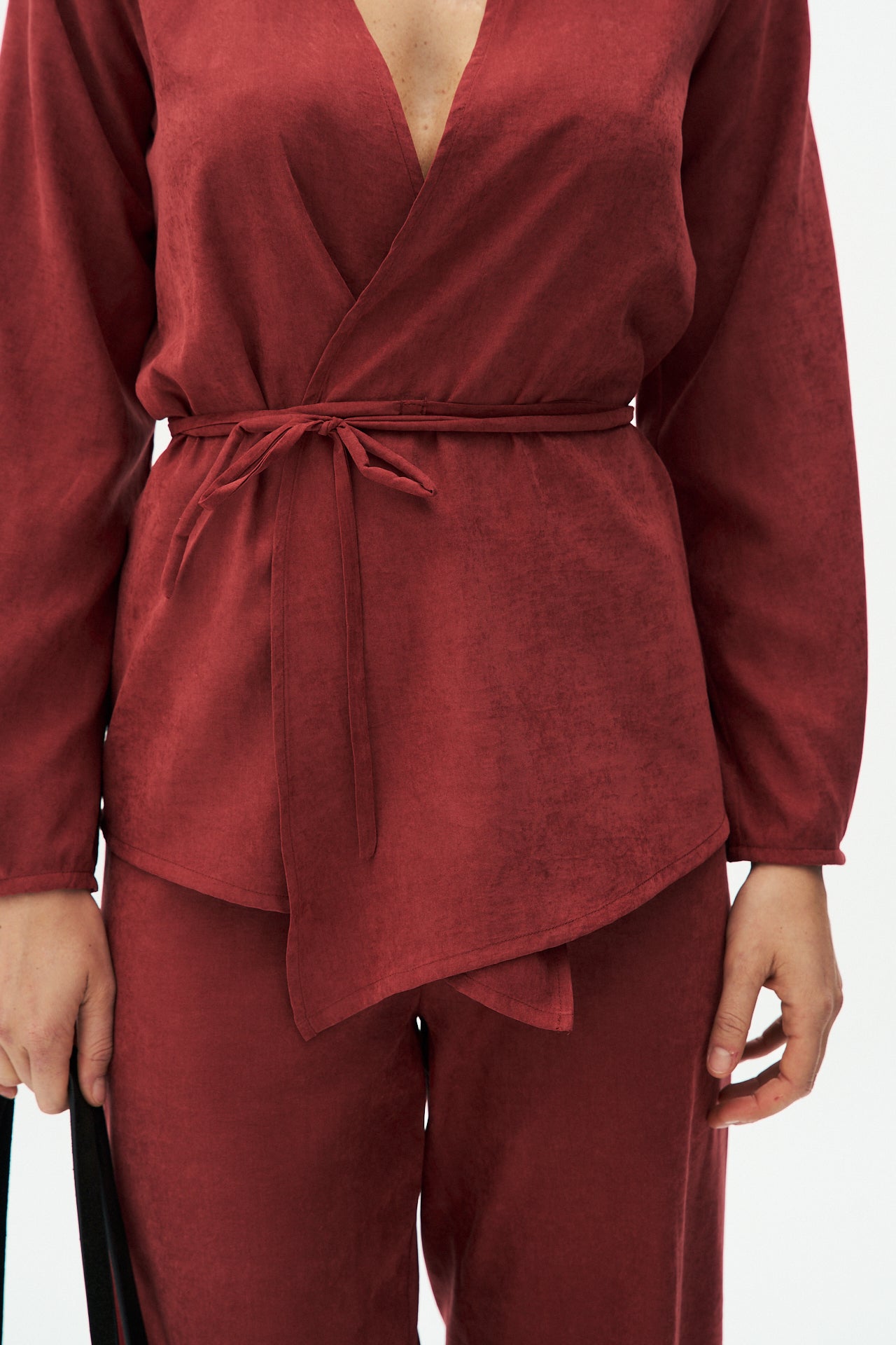 Red textured blouse with tie