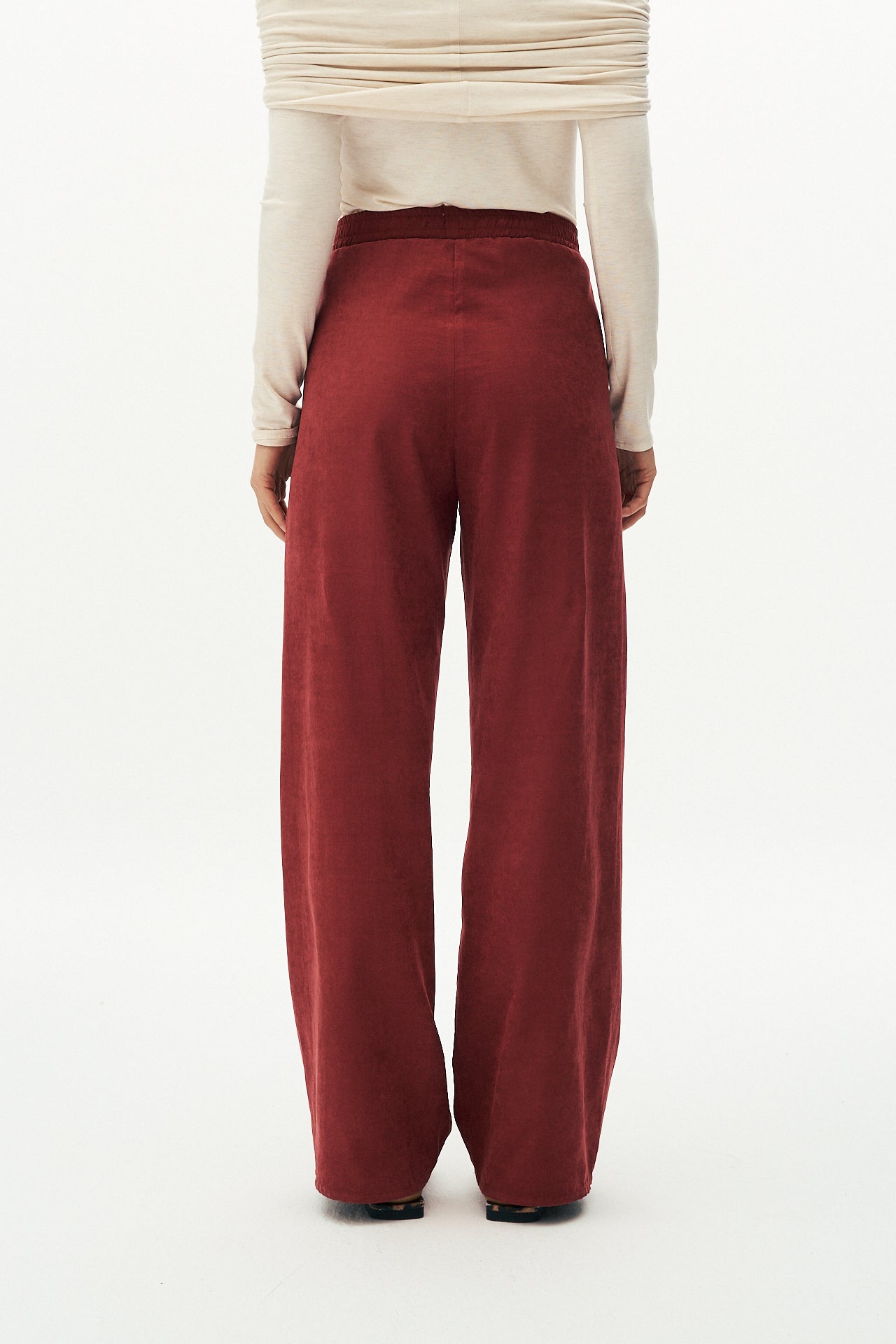 Red textured trousers