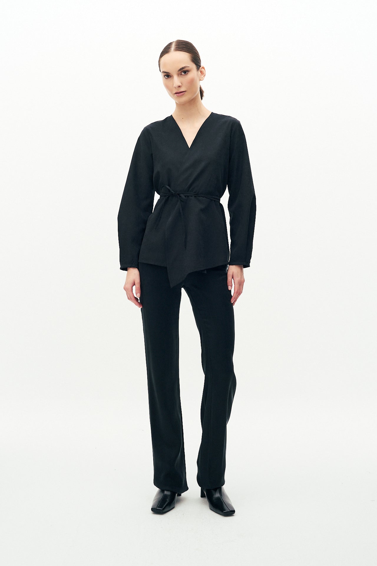 Black textured blouse with tie