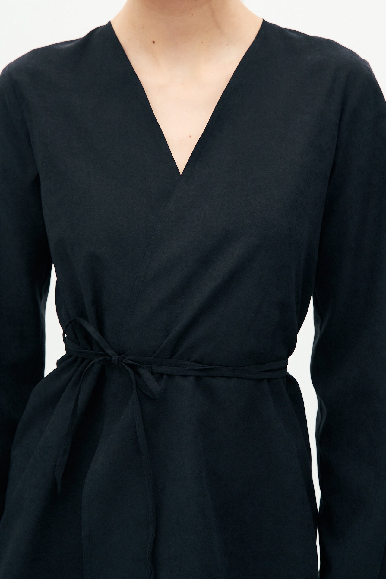 Black textured blouse with tie